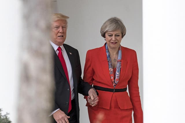 Theresa May was photographed holding hands with the US President at the White House in January