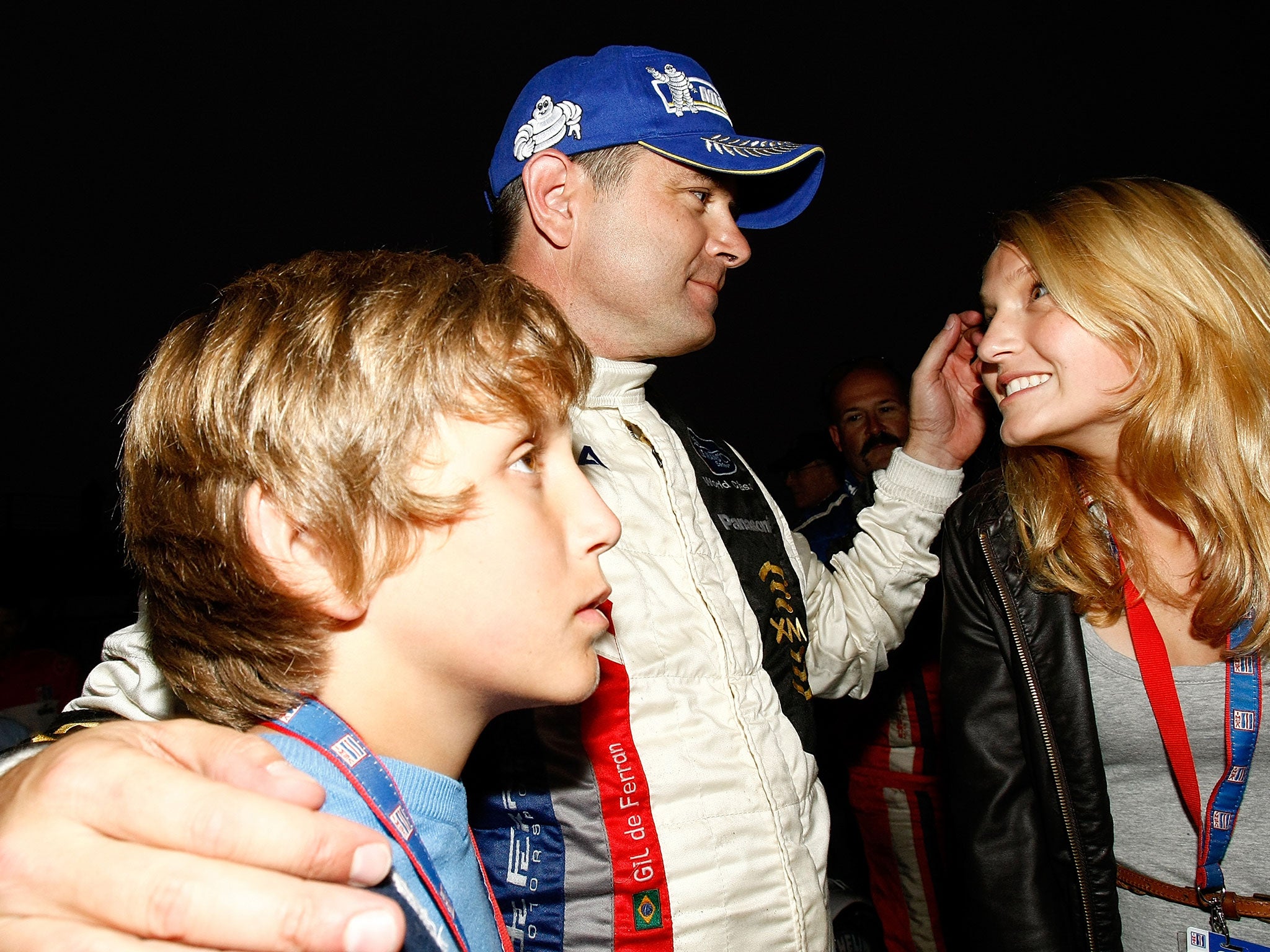 Gil de Ferran with his family in 2009 following his final race before retirement