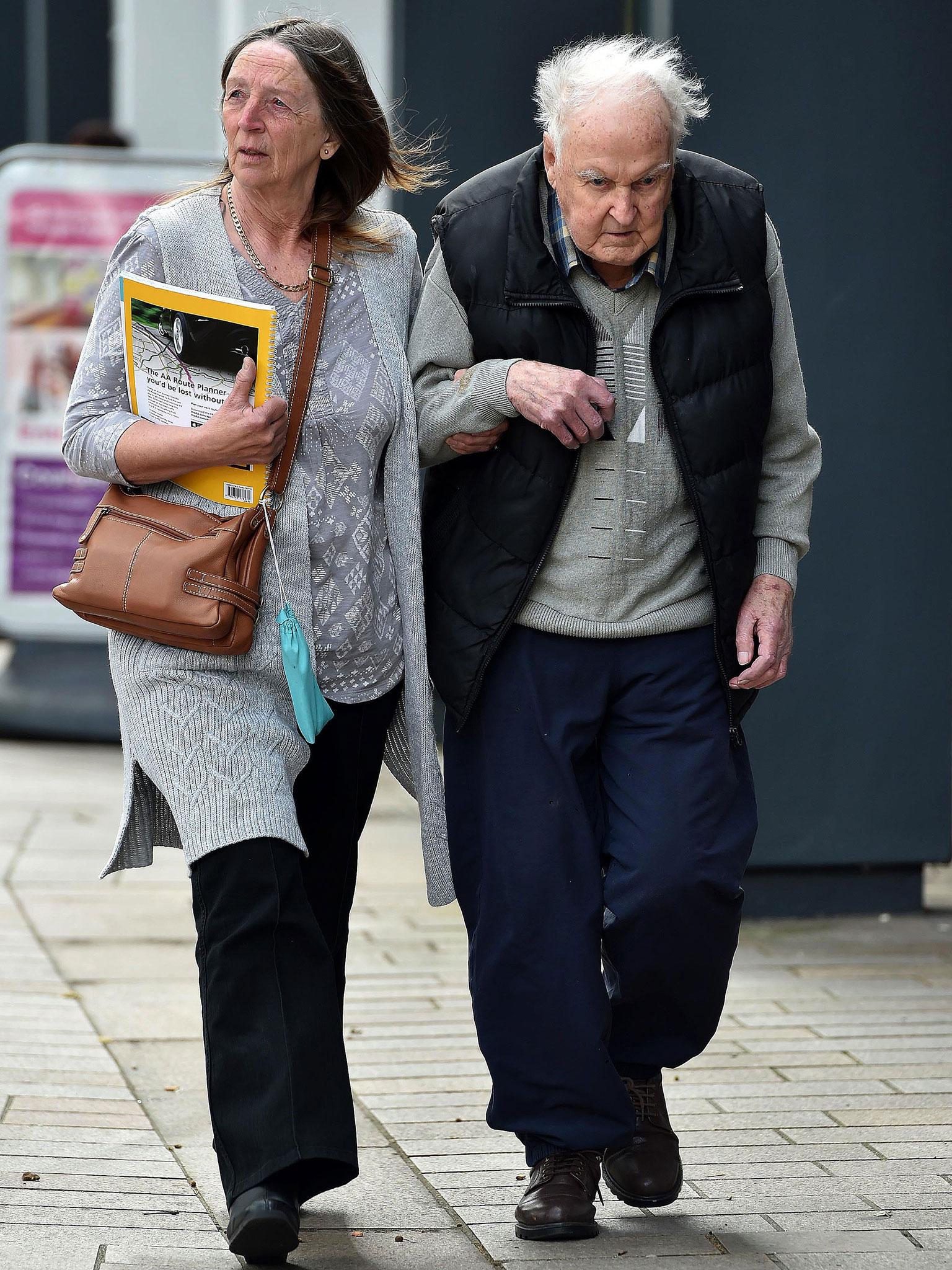 Denver Beddows leaves Liverpool Crown Court with an unidentified woman