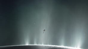 Nasa's Cassini spacecraft is shown diving through the plume of Saturn's moon Enceladus in 2015