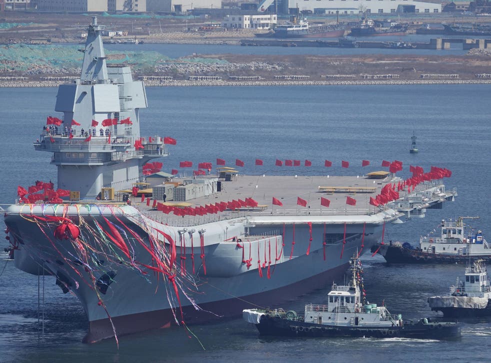 China's first domestically built aircraft carrier is seen during its launching ceremony in Dalian, Liaoning
