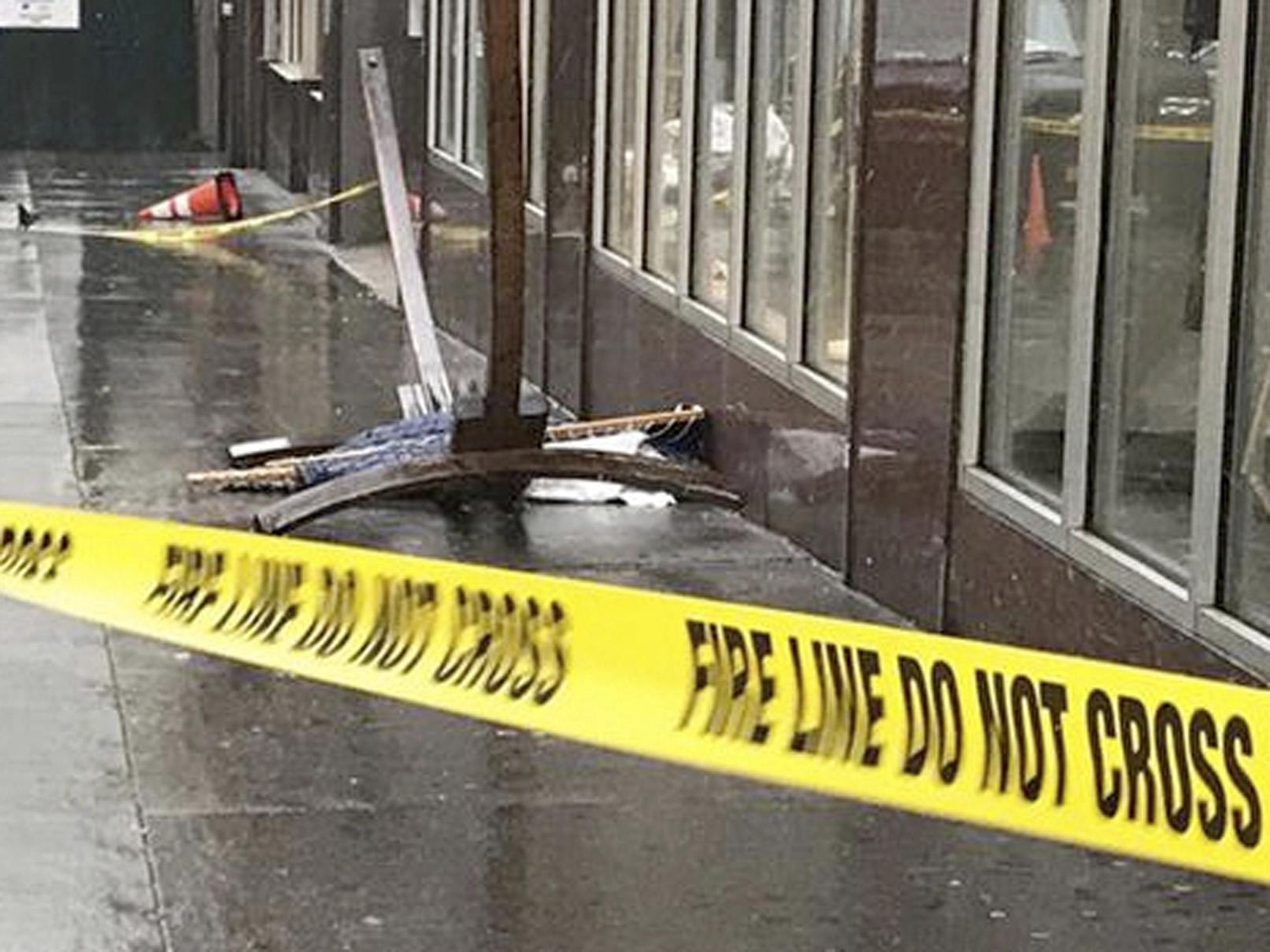 A wooden-framed hammock fell from a fifth-floor roof terrace in New York, seriously injuring a British woman