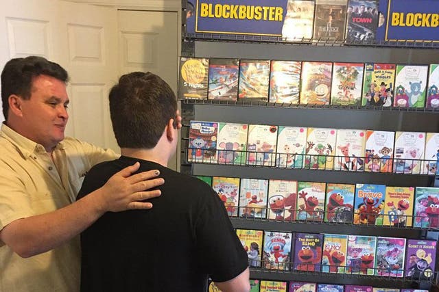 Hector's father shows his son the surprise new mini-Blockbuster store in their home