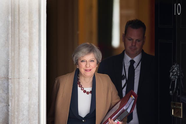 Theresa May appeared to signal the triple lock will be dropped