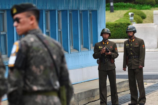 North Korean soldiers patrol the Demilitarised Zone, the border between North and South Korea