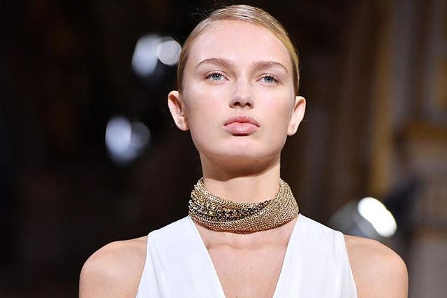For Lanvin's spring/summer 2017 collection gold shiny chokers twisted together