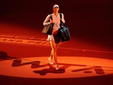 Sharapova hits back on return to tennis with victory in Germany