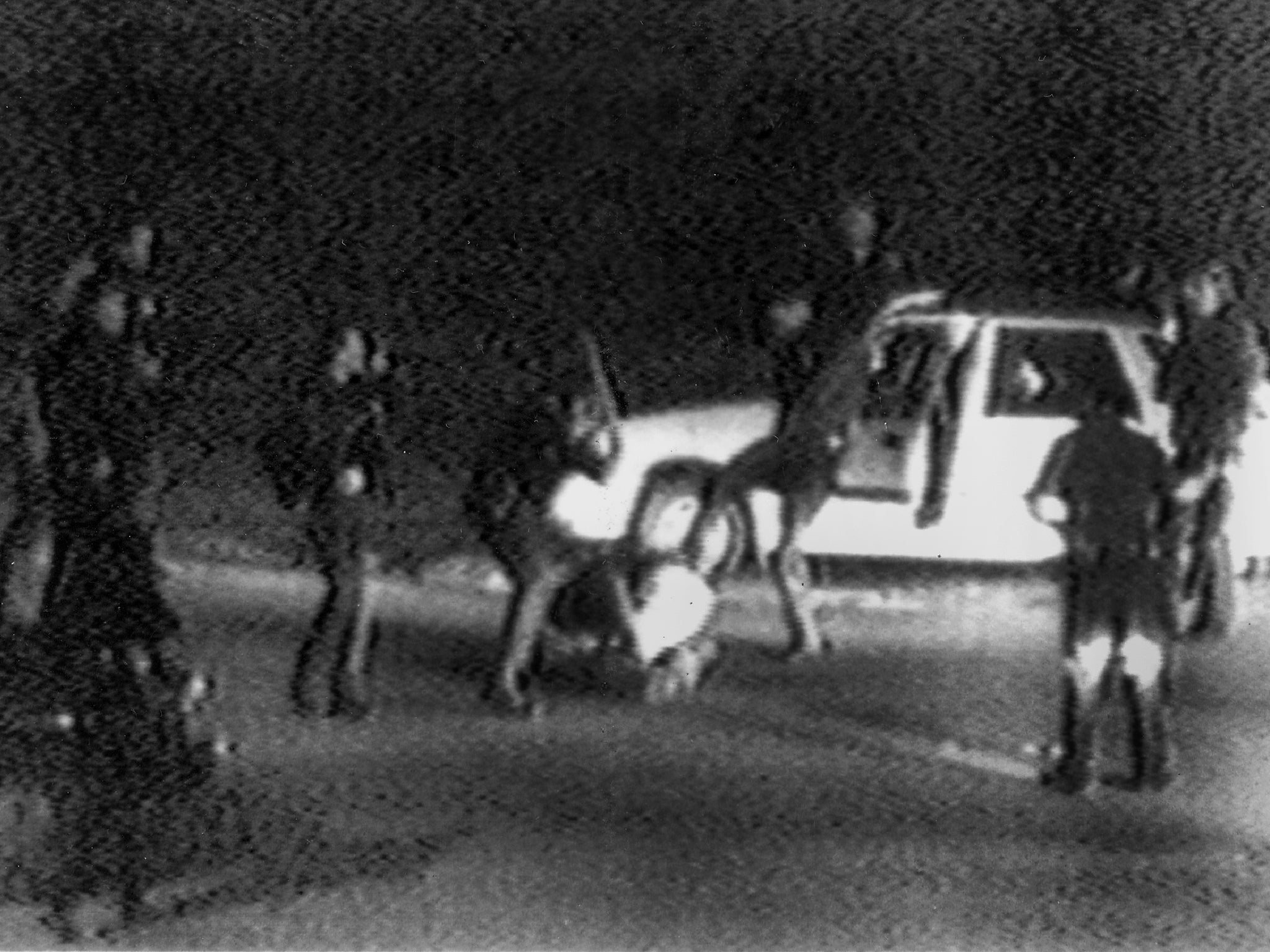 Footage of Rodney King being beaten by LAPD officers in 1991