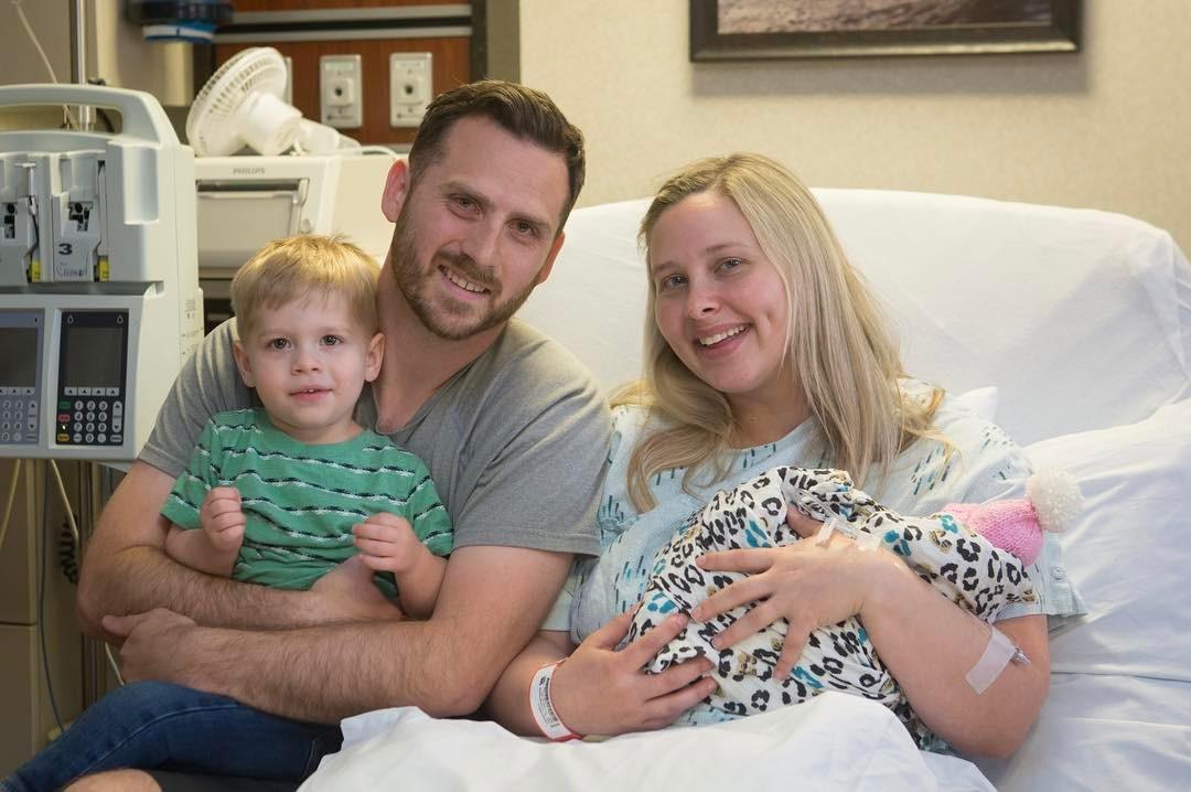 A photo Mr Young posted on Facebook shows the couple with their son and their newborn daughter, whose organs will be