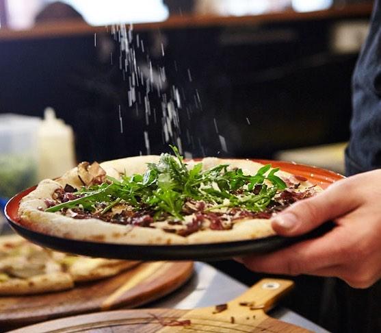 Vegan pizza is served at Red Sparrow in Melbourne