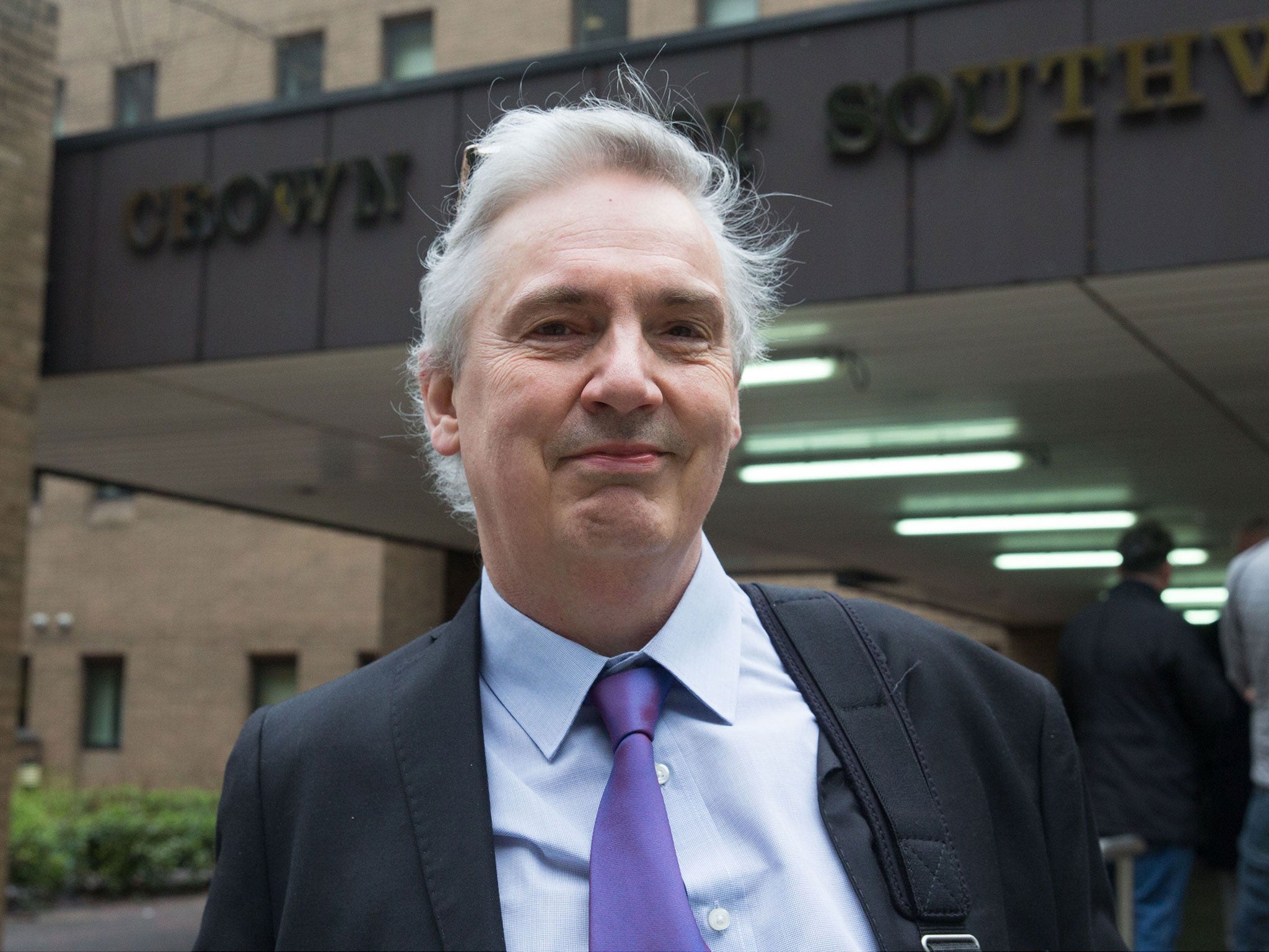 Tim Burton outside Southwark Crown Court before the start of his trial for racially aggravated harassment