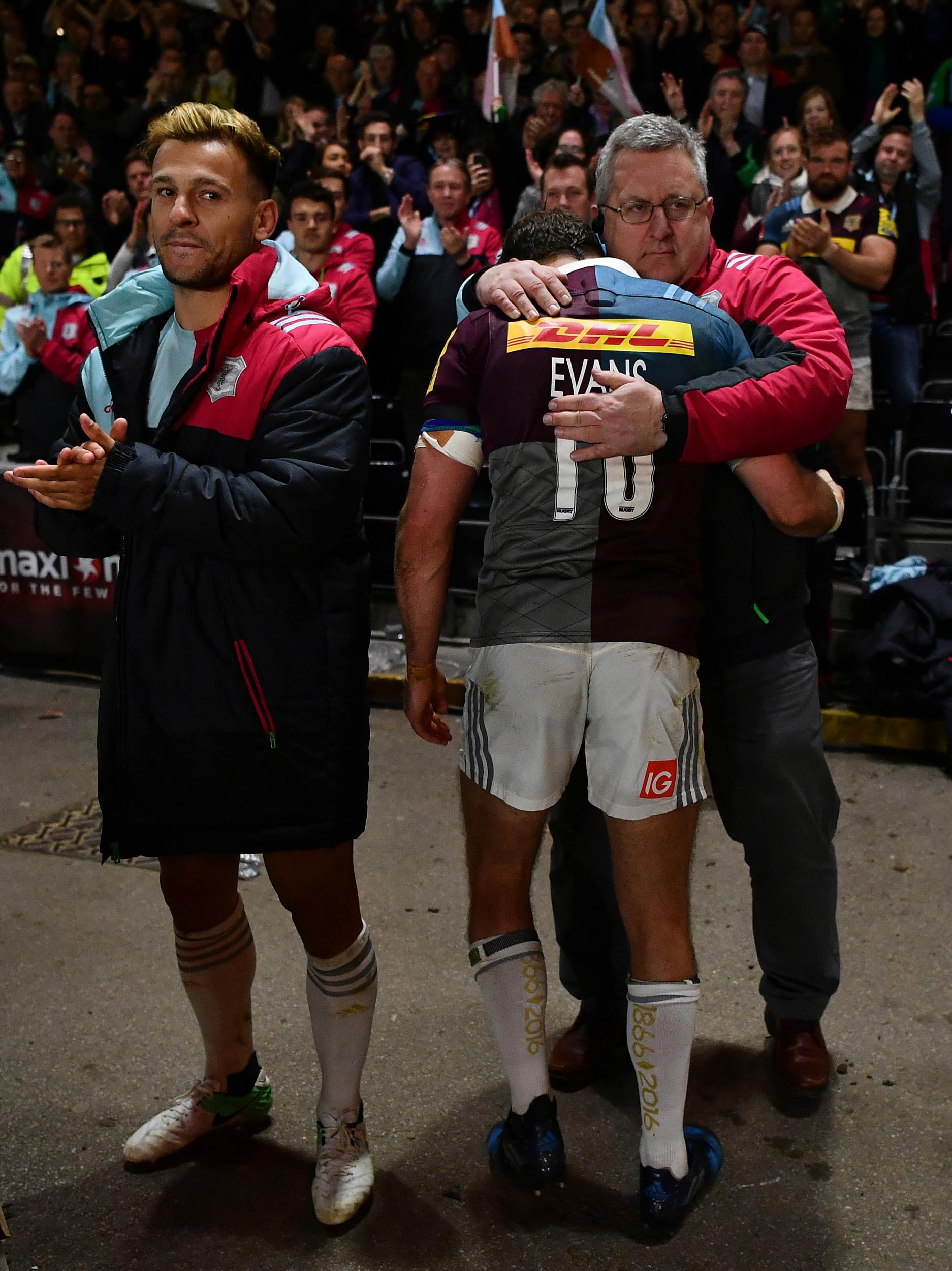 The departing Evans gets a hug from John Kingston, Harlequins Director of Rugby