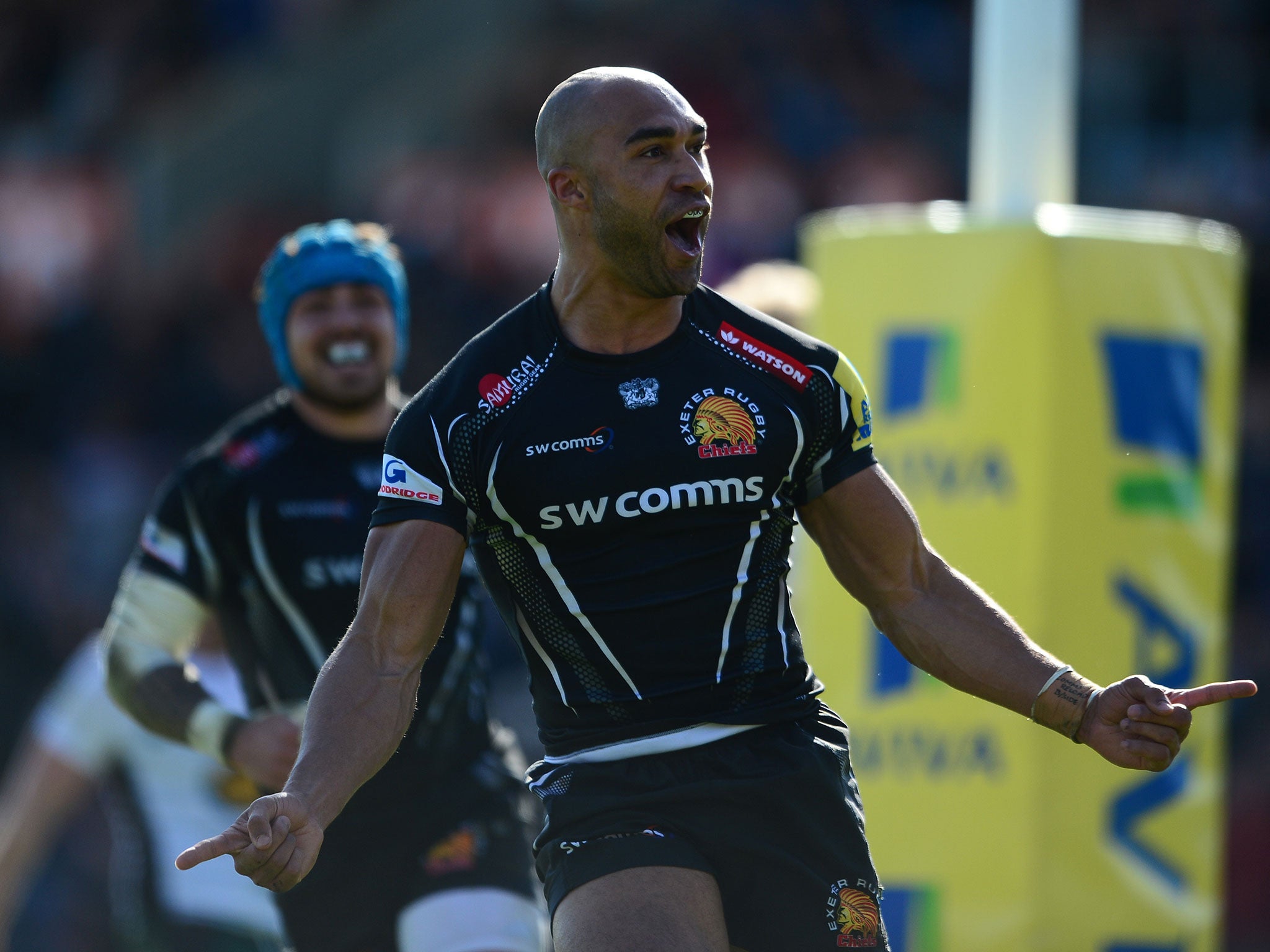 Olly Woodburn celebrates after scoring a try for Exeter against Northampton Saints