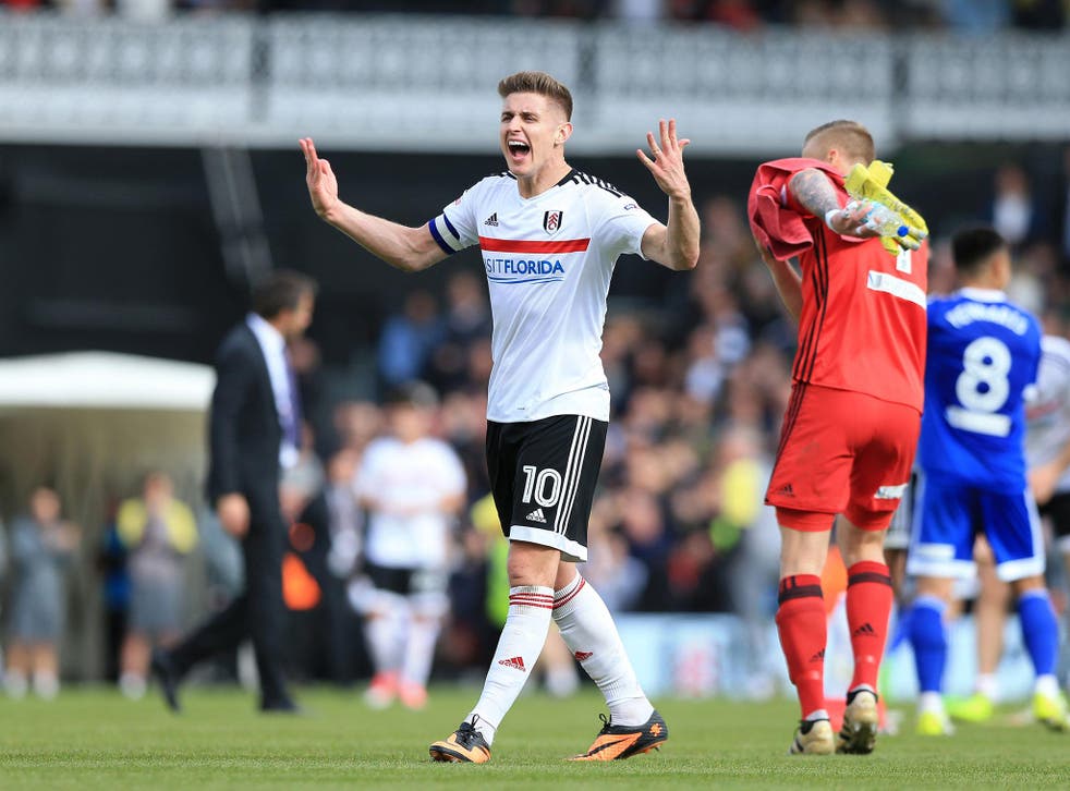 Tom Cairney celebrates after scoring for Fulham against Brentford