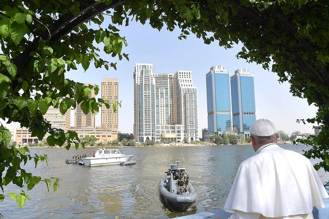 Pope Francis looks over the river Nile from a terrace, during a meeting with the clergy and religious, in Cairo