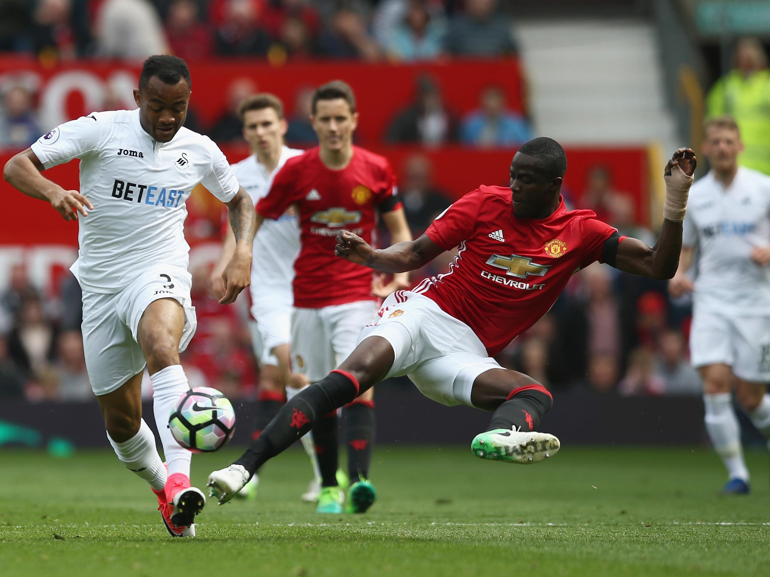 Eric Bailly lunges to make a challenge