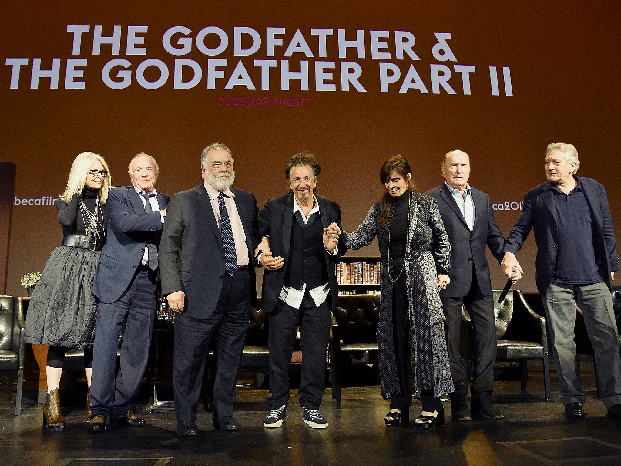 Diane Keaton, James Caan, Francis Ford Coppola, Al Pacino, Talia Shire, Robert Duvall and Robert DeNiro take a bow on stage during the panel for 'The Godfather' 45th Anniversary Screening during 2017 Tribeca Film Festival closing night at Radio City Music Hall