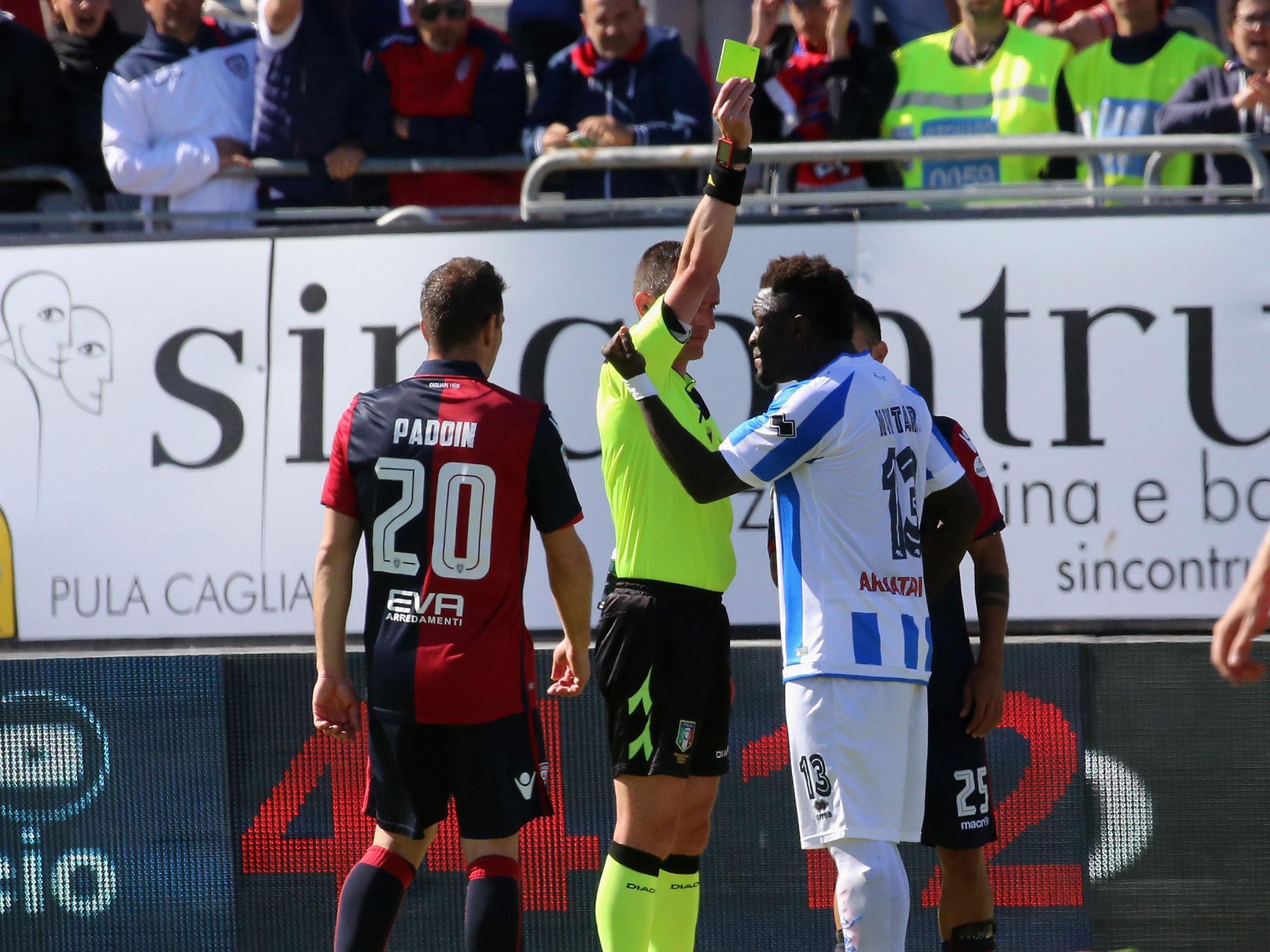 Sulley Muntari has been banned after being issued with a yellow card for reporting racial abuse