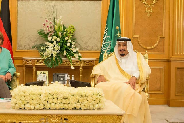 King Salman bin Abdulaziz al-Saud of Saudi Arabia hosts German Chancellor Angela Merkel in Jeddah