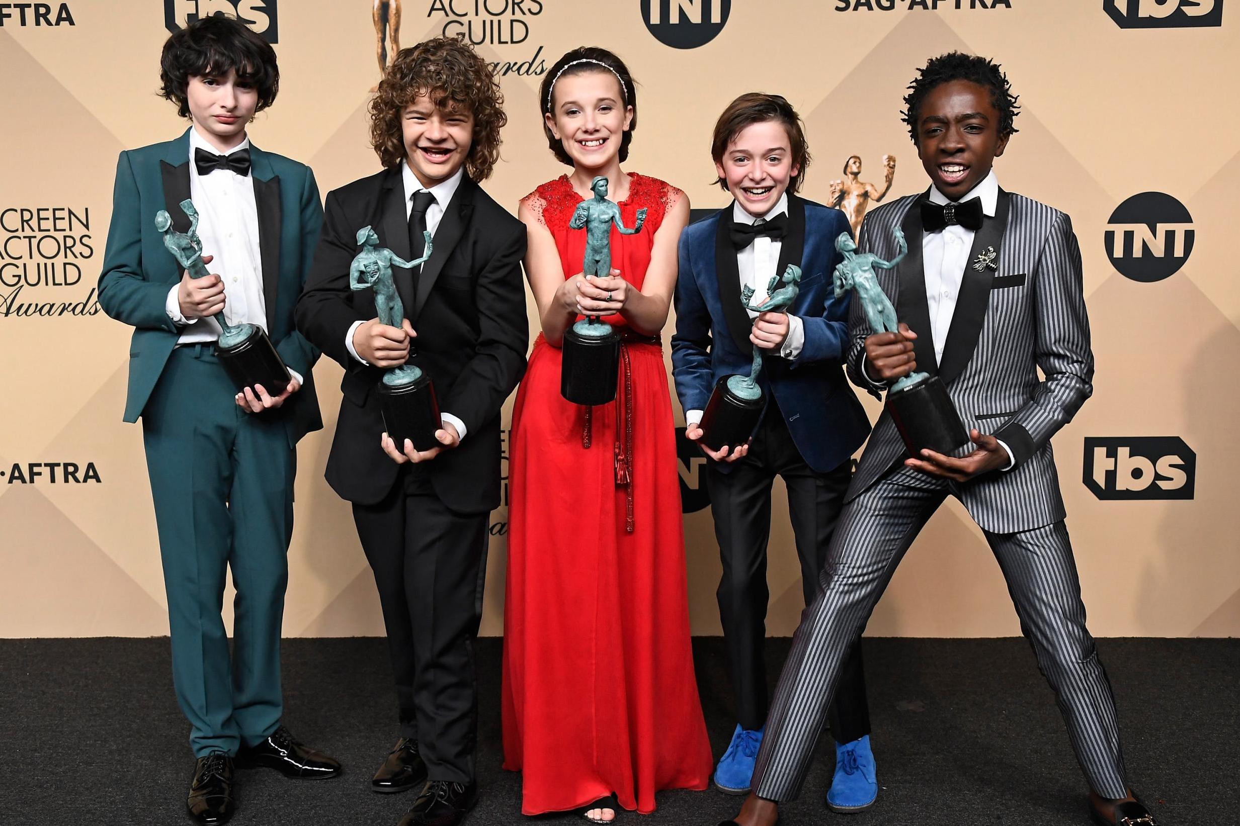 Picture: Actors Finn Wolfhard, Gaten Matarazzo, Millie Bobby Brown, Noah Schnapp, and Caleb McLaughlin, co-recipients of the Outstanding Performance by an Ensemble in a Drama Series award for 'Stranger Things/