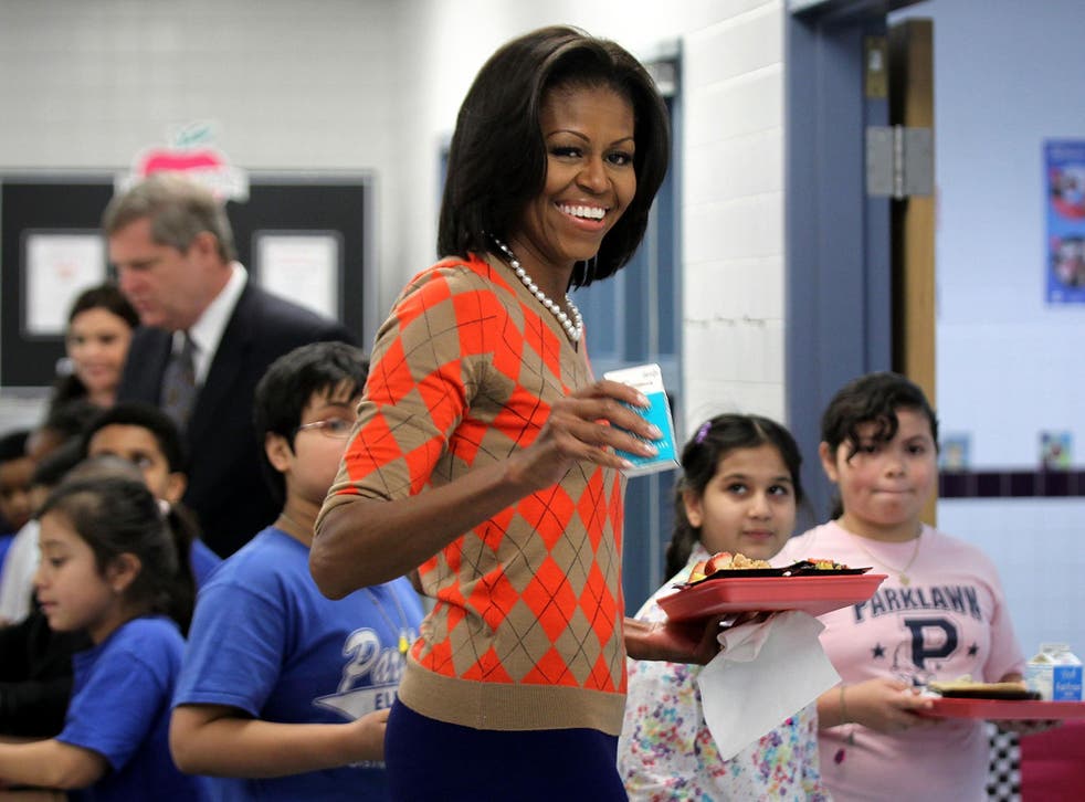 Michelle Obama campaigned for rules restricting levels of salt, fat and sugar in school meals