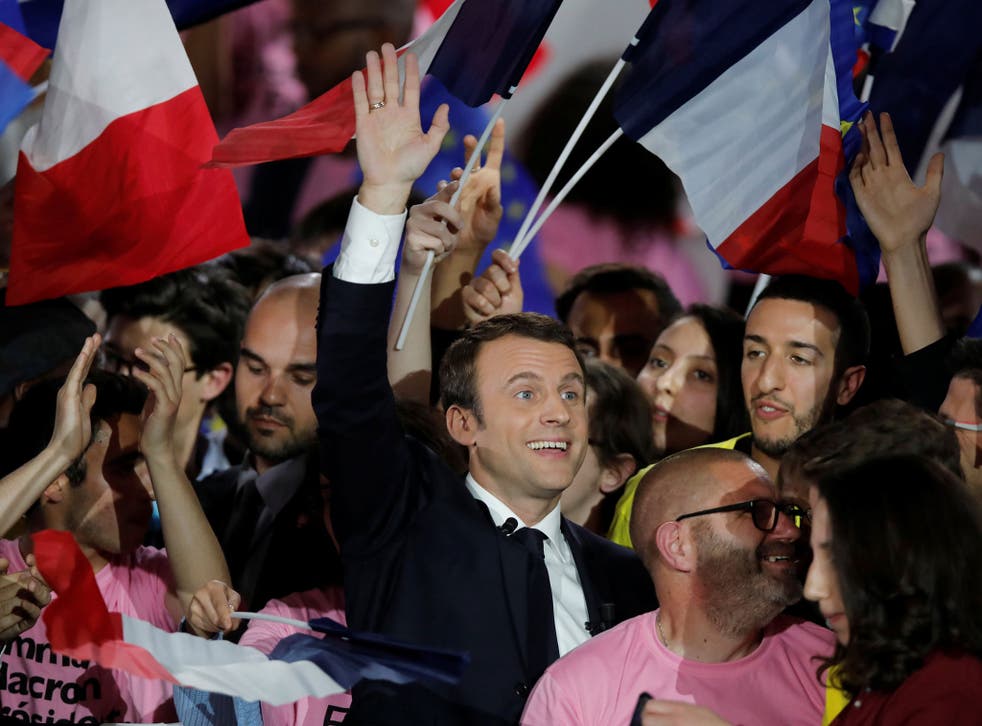Emmanuel Macron attending a campaign rally in Paris, where his rival Marine Le Pen was also attempting to drum up support