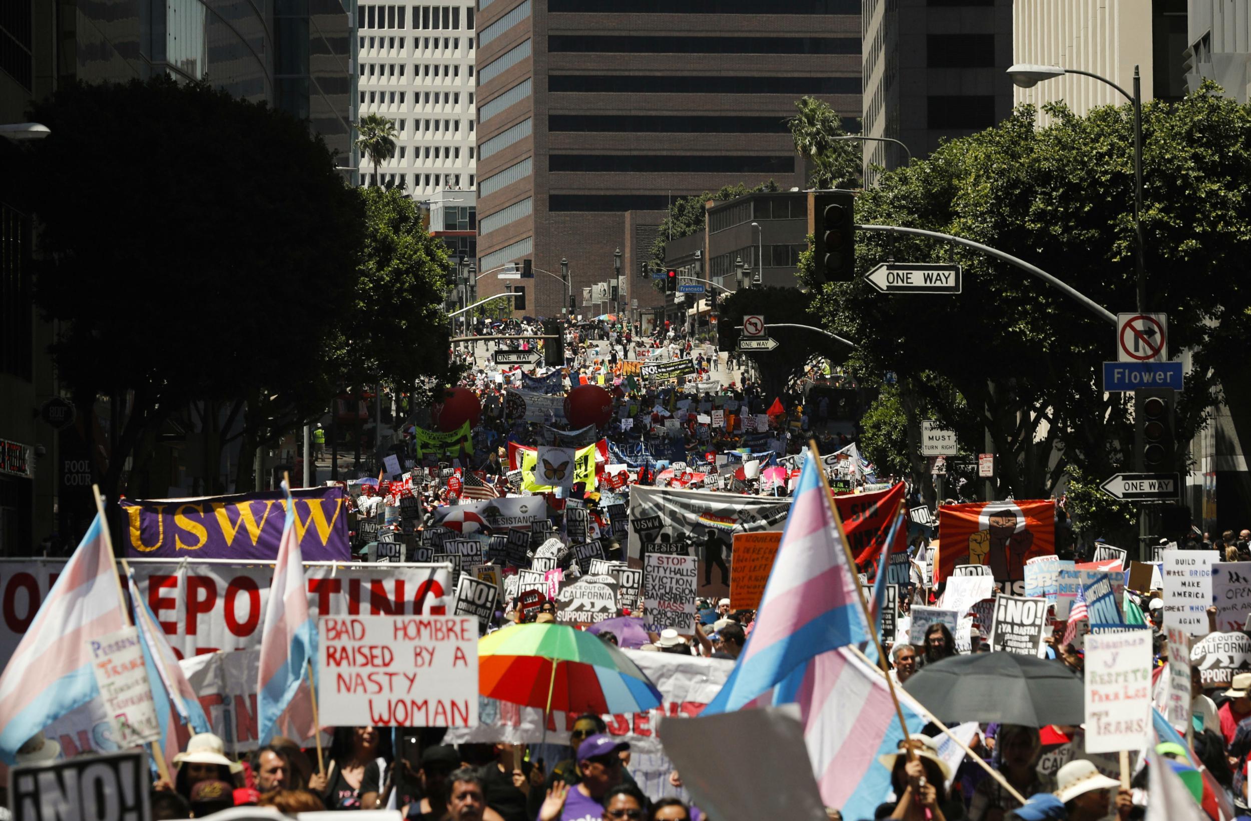 Thousands marched through downtown Los Angeles in a May Day protest against Donald Trump