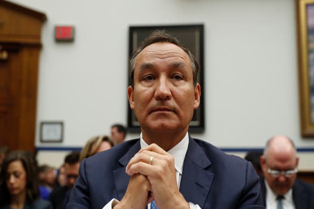 United Airlines CEO Oscar Munoz prepares to testify on Capitol Hill in Washington