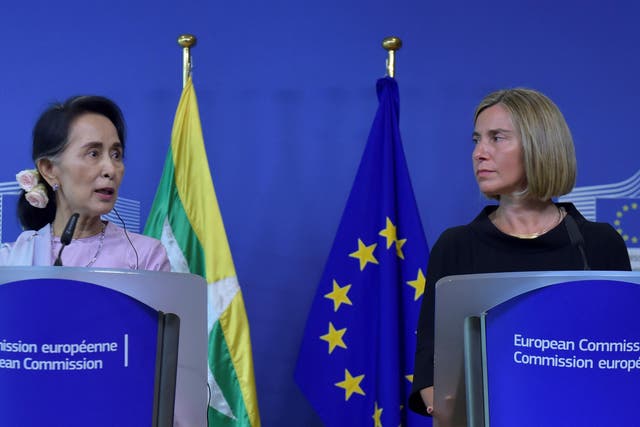 European Union foreign policy chief Federica Mogherini gives a news conference with Burma's State Counsellor Aung San Suu Kyi in Brussels, Belgium, 2 May 2017