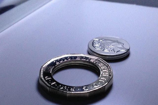 Owners of £1 coins with centres missing have been putting them up for sale on eBay