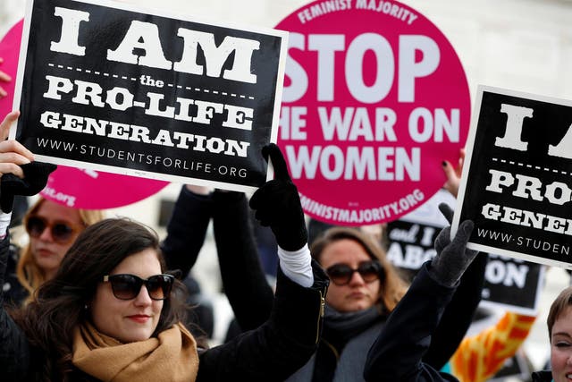 Pro-life activists on the march in Washington, D.C. The issue remains a divisive concern across the US