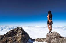 Playboy model causes outrage by posing naked on sacred mountain