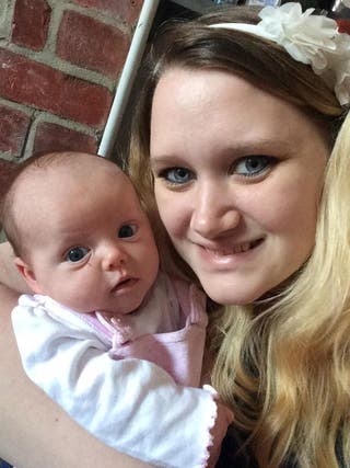 Woman posts naked breastfeeding photo to remind mothers 'nobody looks