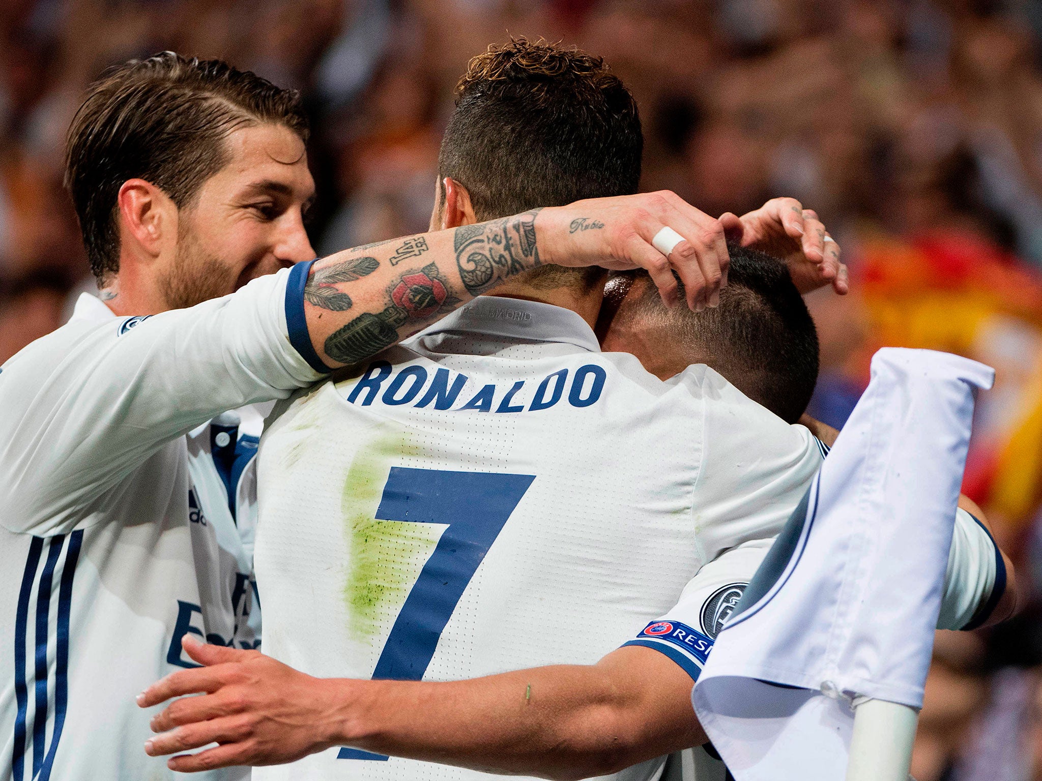 Ronaldo celebrates with his team-mates after scoring Real's first