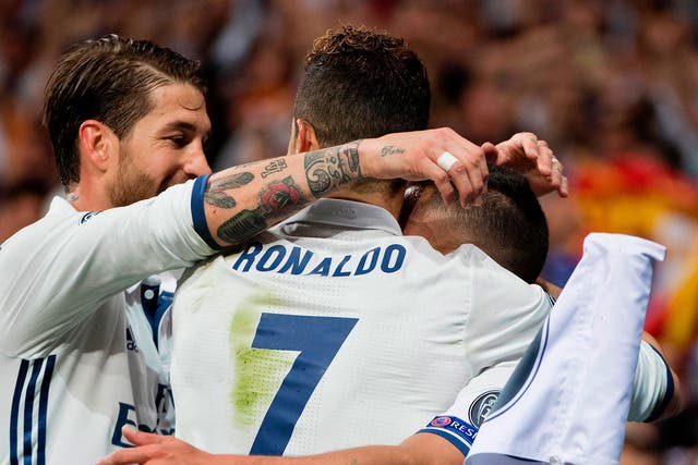 Ronaldo celebrates with his team-mates after scoring Real's first