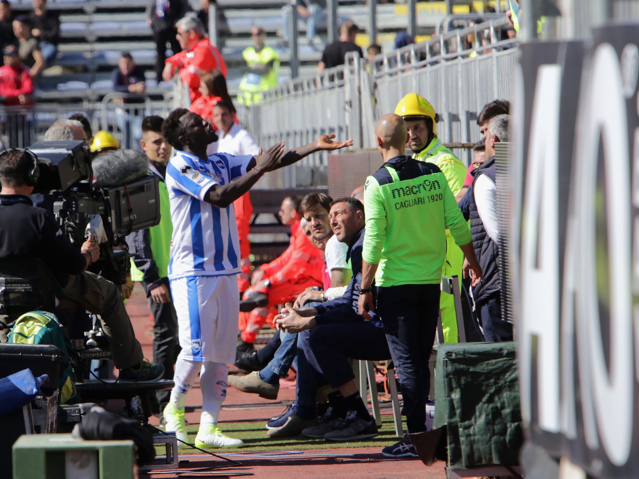 Muntari confronted the fans who abused him