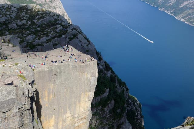 Preikestolen cliff attracts tourists from all over the world 