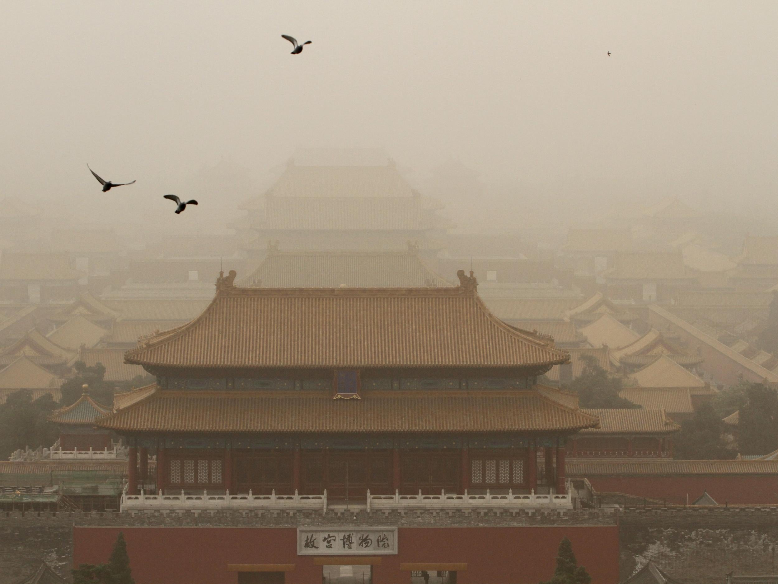 The Forbidden City is seen during a dust storm in Beijing
