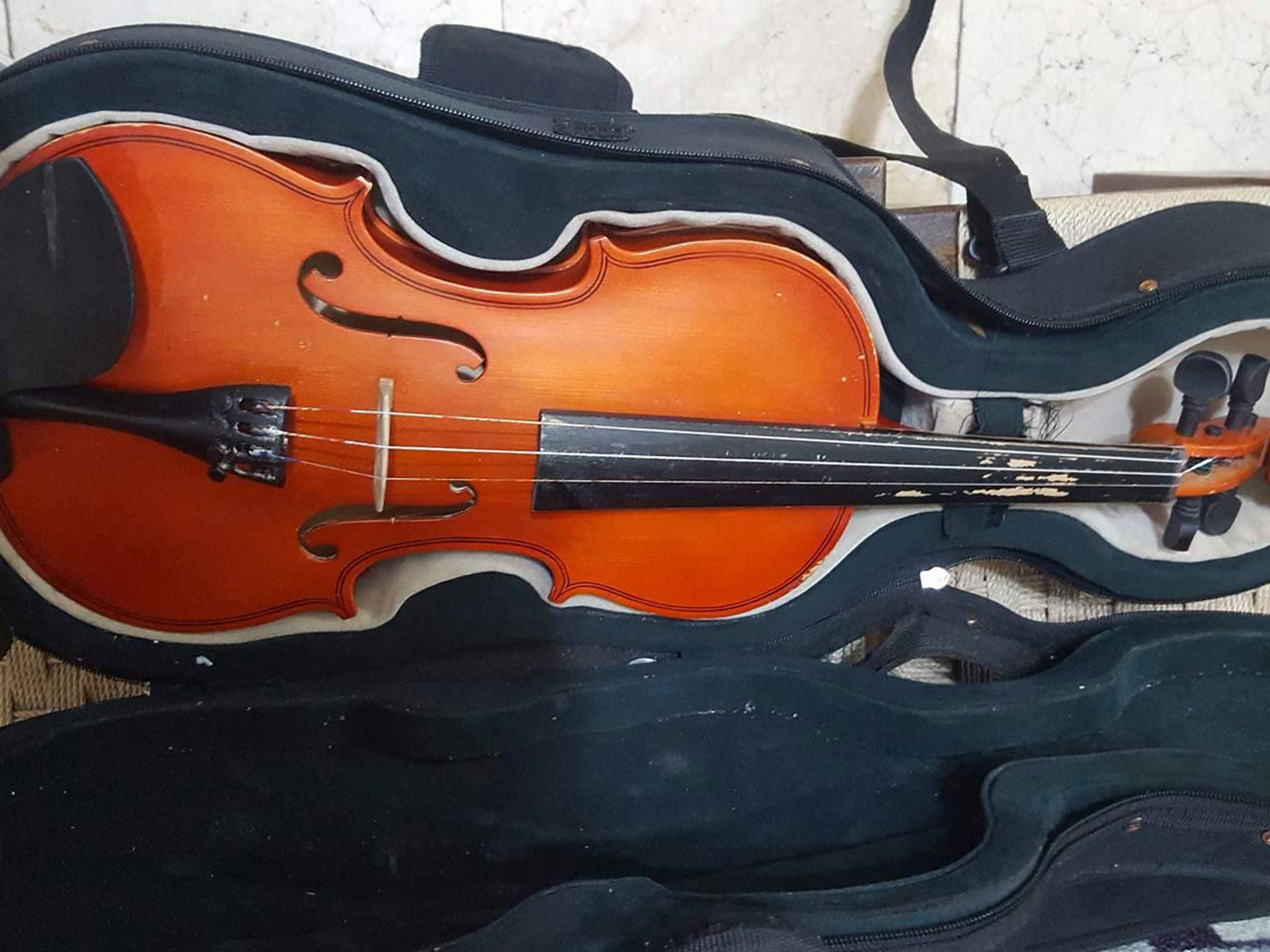 ‘He loved the violin so much, he didn’t let it go even when he drowned’