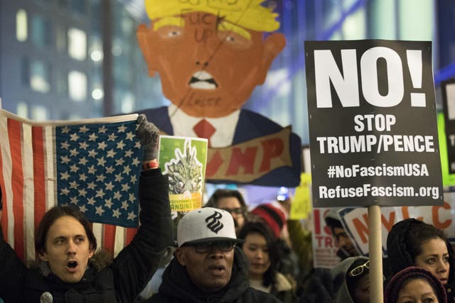 Activists rally against President Donald Trump
