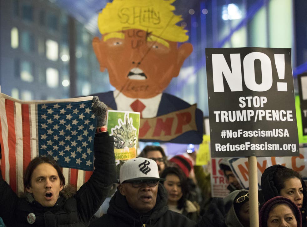 Activists rally against President Donald Trump