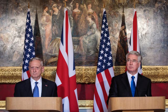 Sir Michael Fallon stands alongside US Defense Secretary James Mattis