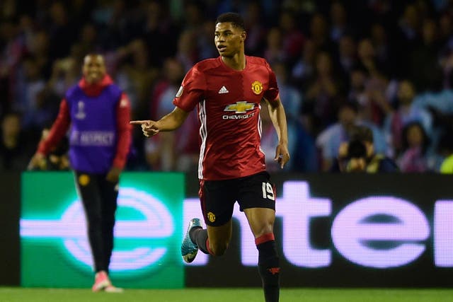 Marcus Rashford celebrates after his free-kick for Manchester United, just seconds after predicting he'd score