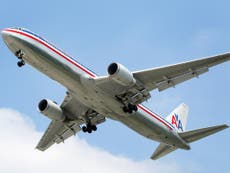 Woman duct-taped to seat after biting flight attendant, trying to open plane’s door, airline says