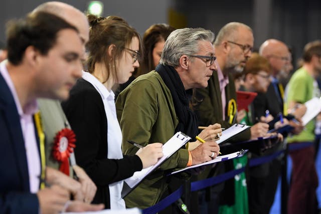 Electoral agents at the local election count in Glasgow's Emirates Arena