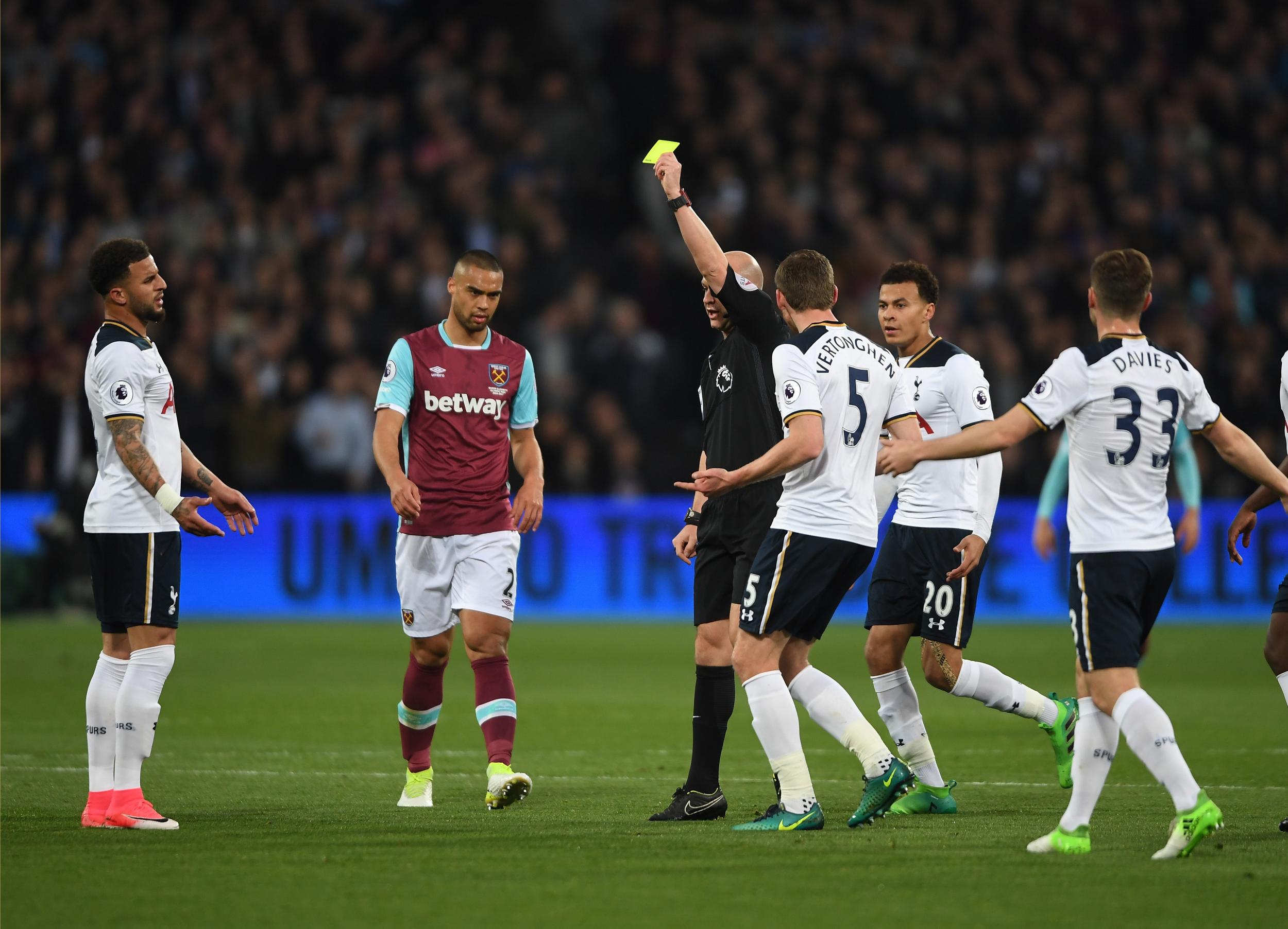 Walker is booked early into the first-half