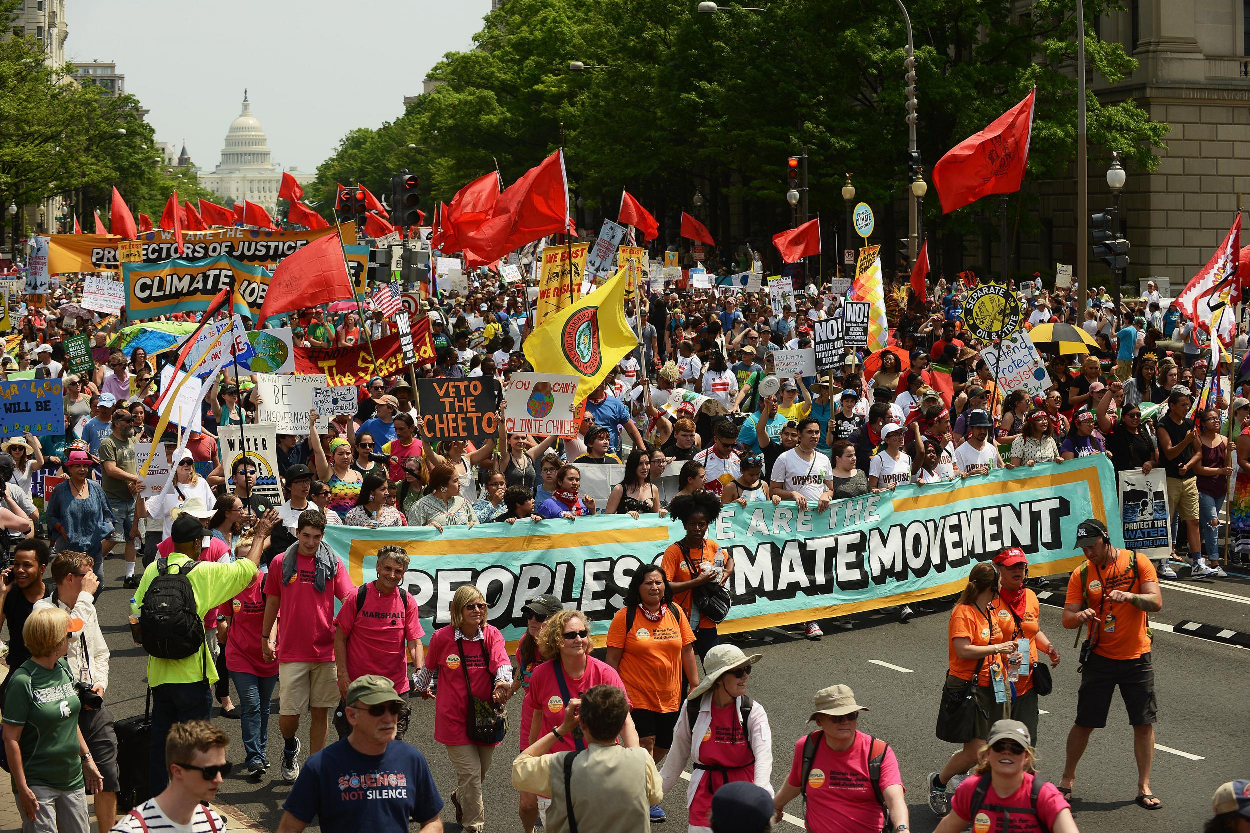 Protesters march in Washington, DC in opposition to Donald Trump's environmental policies
