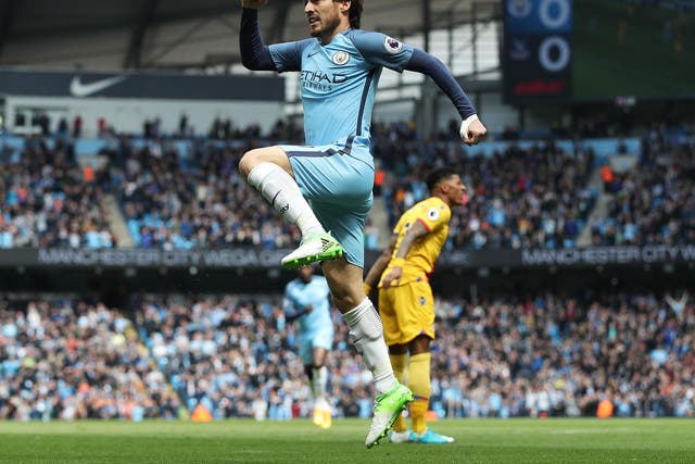 David Silva celebrates putting Manchester City ahead inside two minutes