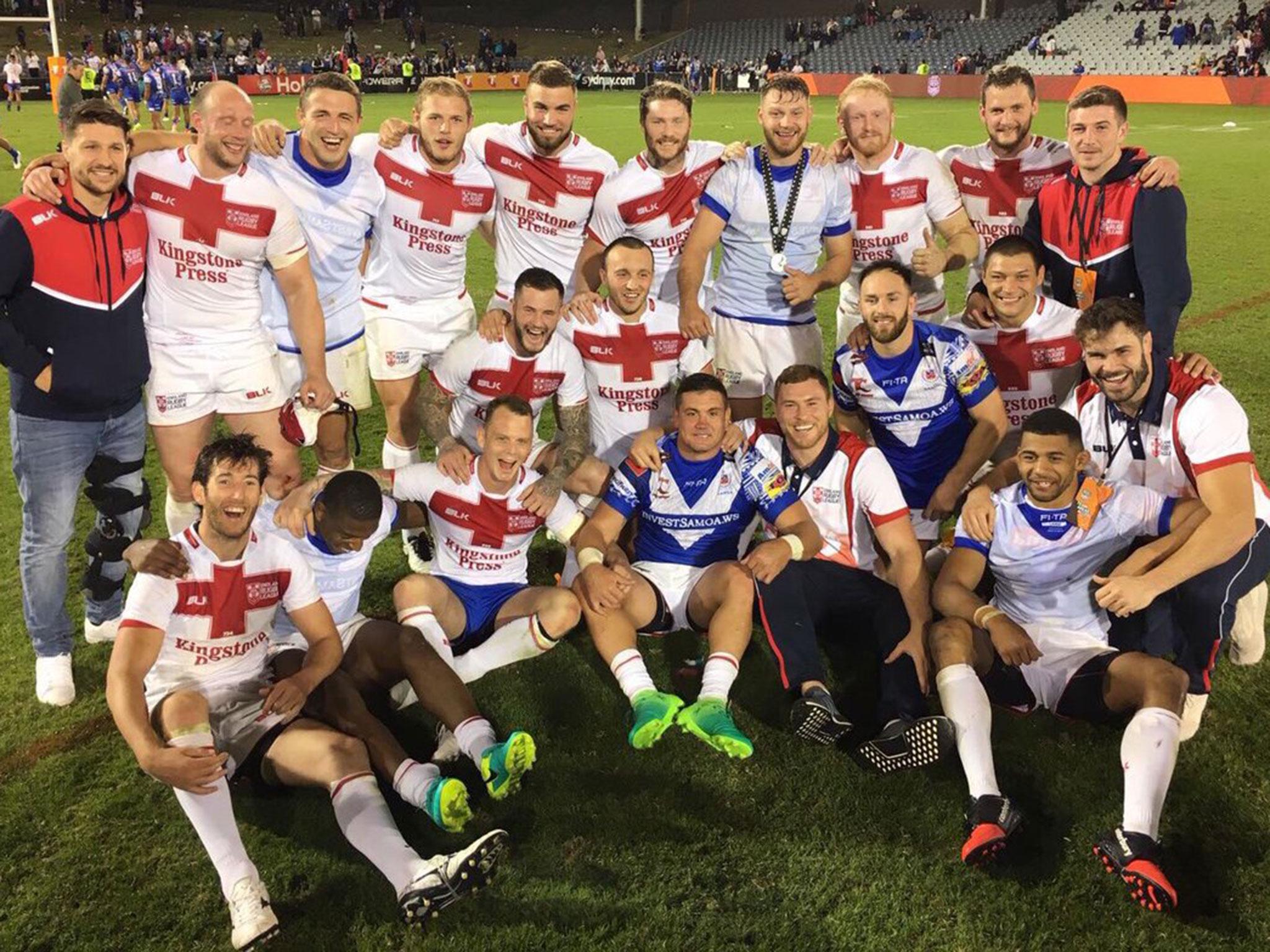 England celebrate their 30-10 victory over Samoa