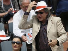 French Open officials follow Wimbledon's lead and ban Nastase
